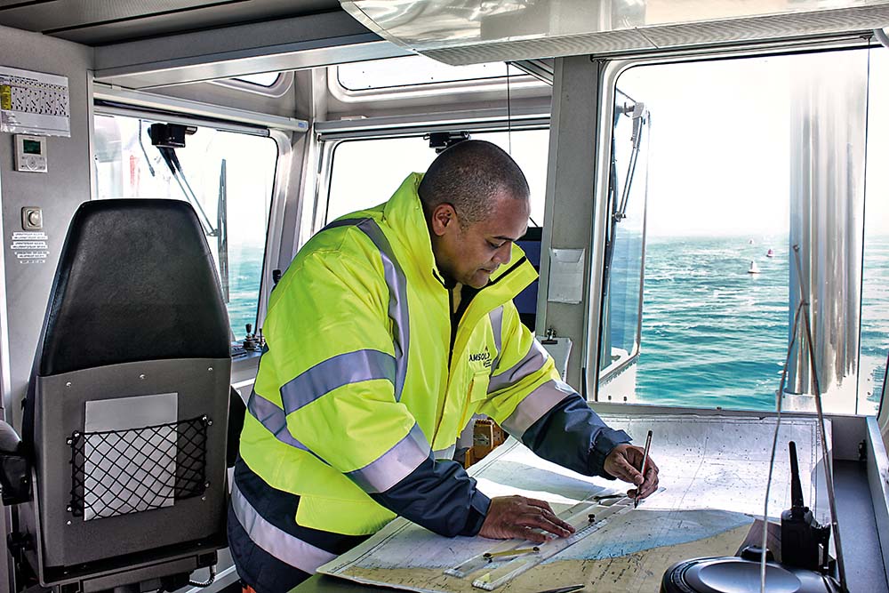 Ship crew member in control room using SMART software by KRS